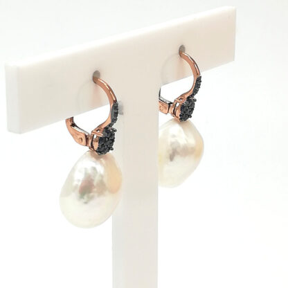 orecchini in oro rosa con perle barocche e tanzanite genesia perle